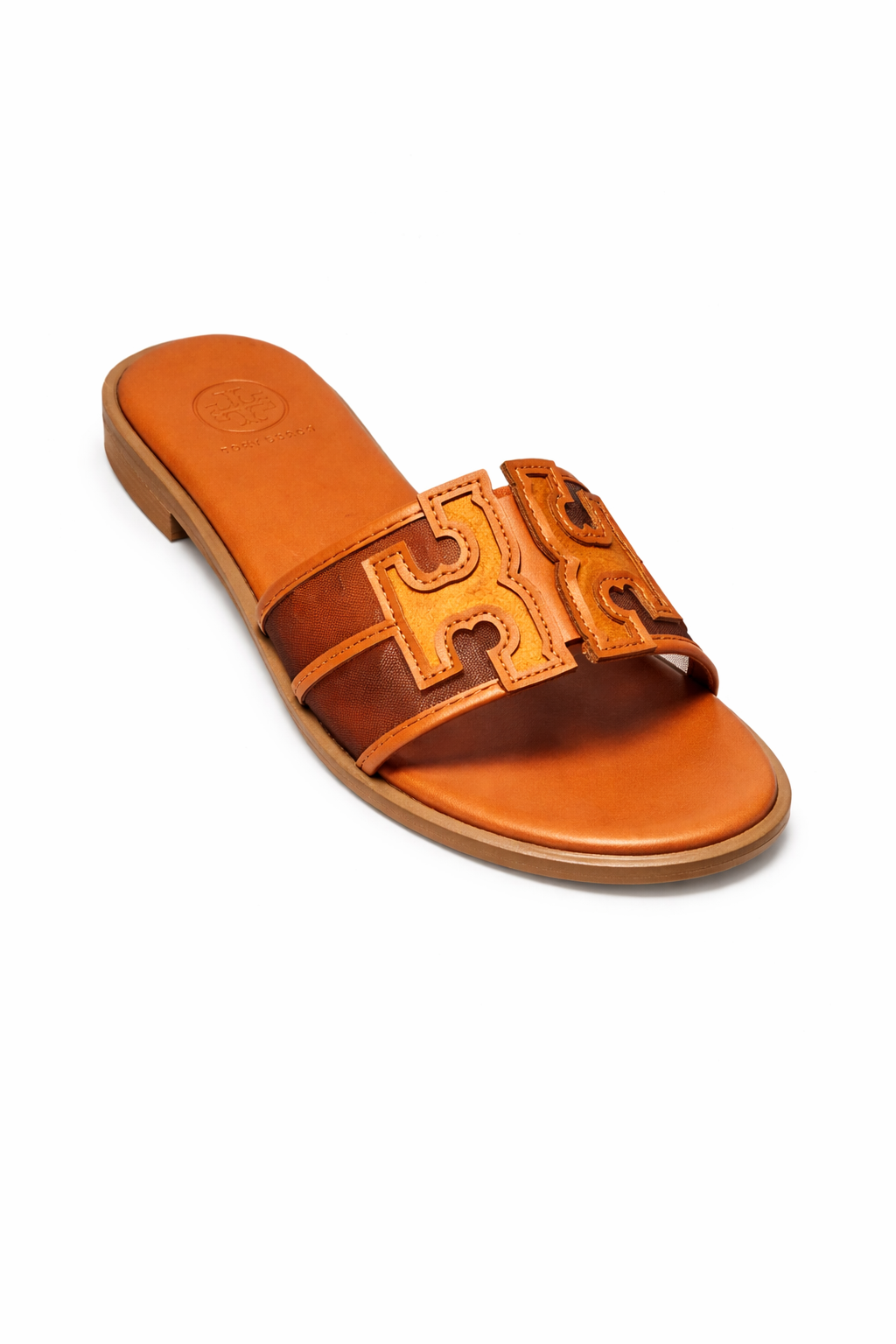 Torry Burch Ines Slide sandals featuring a signature Double T logo.
